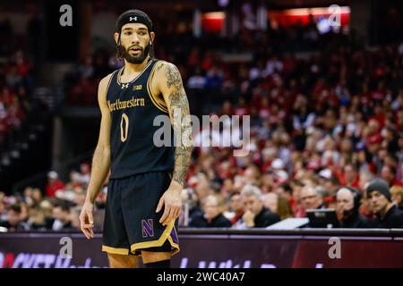 Madison, WISCONSIN, États-Unis. 13 janvier 2024. Les Wildcats de Northwestern gardent Boo Buie (0) lors du match de basket-ball de la NCAA entre les Wildcats de Northwestern et les Badgers du Wisconsin au Kohl Center de Madison, WISCONSIN. Darren Lee/CSM/Alamy Live News Banque D'Images