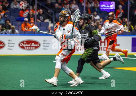 13 janvier 2024 : Buffalo bandits transitionnel Nick Weiss (20) court dans le quatrième quart-temps contre les Knighthawks de Rochester. Les Knighthawks de Rochester ont accueilli les bandits de Buffalo dans un match de la National Lacrosse League à Blue Cross Arena à Rochester, New York. (Jonathan Tenca/CSM) Banque D'Images