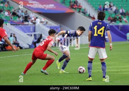 Doha, Qatar. 14 janvier 2024. DOHA, QATAR - JANVIER 14 : Yukinari Sugawara du Japon lors du match du groupe D de la coupe d'Asie de l'AFC entre le Japon et le Vietnam au stade Al Thumama le 14 janvier 2024 à Doha, Qatar Credit : Sebo47/Alamy Live News Banque D'Images