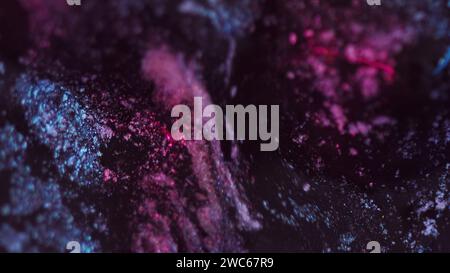 Peinture fluide scintillante renverse de l'encre bleue rose noire Banque D'Images