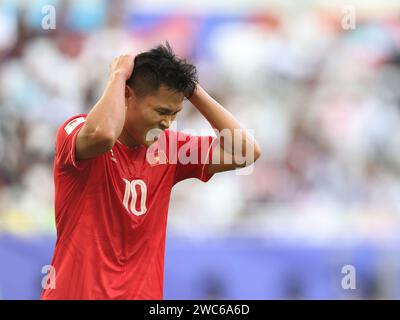 Doha, Qatar. 14 janvier 2024. Pham Tuan Hai, du Vietnam, réagit lors du match du Groupe D entre le Japon et le Vietnam à la coupe d’Asie de l’AFC à Doha, Qatar, le 14 janvier 2024. Crédit : CAO CAN/Xinhua/Alamy Live News Banque D'Images