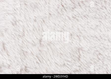 Texture de fond de tissu en fausse fourrure blanche. Plein format Banque D'Images