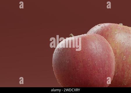 Photographie rapprochée de pommes fraîches avec gouttes de rosée Banque D'Images