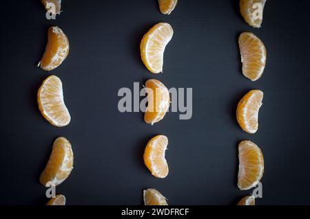 Mandarine vibrante sur fond noir photographie de nourriture Banque D'Images