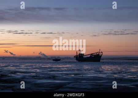 Lever du soleil sur l'estuaire de la Tamise, Essex, Angleterre, Royaume-Uni Banque D'Images
