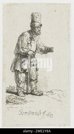 Un paysan dans une casquette haute, debout appuyé sur un bâton, Rembrandt van Rijn, 1639 papier gravé les âges de l'homme (+ vieil homme (être humain)) Banque D'Images