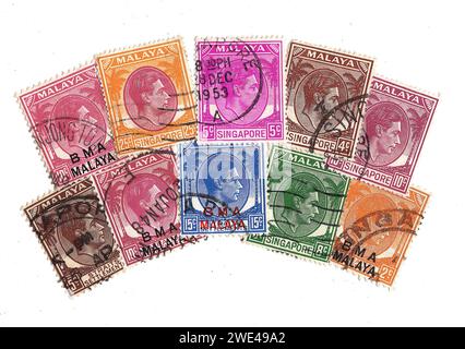 Timbres-poste vintage de Malaisie représentant un portrait du roi George VI isolé sur fond blanc. Banque D'Images
