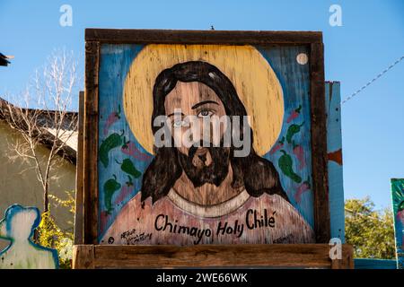 Signalisation auto-promotionnelle pour Arthur Medina, situé en face du Santuario de Chimayo, à Chimayo, Nouveau-Mexique Banque D'Images