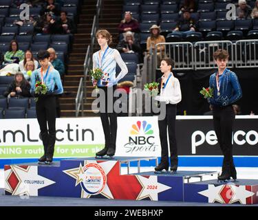 Columbus, Ohio, États-Unis. 24 janvier 2024. Les vainqueurs de la compétition junior de patinage artistique masculin aux Championnats américains de patinage artistique. Taira Shinohara, Lucius Kazanecki, Alexandr Fegan et Beck Strommer. Crédit : Brent Clark/Alamy Live News Banque D'Images