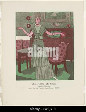 GAZETTE DU BON TON, 1914 - n° 6, p. XII : annonce chez Mercier Frères, tapissiers, Paris, 1914 Publicité chez Mercier Frères, Tapissiers-Décorateurs, Paris : Femme en robe verte avec volants, debout dans un intérieur dans des tons rouges et verts. Page XII dans Gazette du bon ton, 1914 - No. 6 impression typographique papier de planches mode Banque D'Images