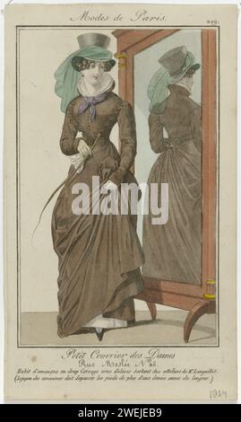 Petit mail des dames, 1824, non 209 : habit amazonien (...), 1824 Femme debout, avec le dos à un miroir de passage, dans un costume amazonien (Rijkostuum) de Laeken. Le corps est décoré avec des olives des studios Languillet. Selon la légende, l'Amazonerok doit tomber et faire plus d'une demi-cuillère à soupe de long. Accessoires : chapeau haut de gamme avec voile, boucle d'oreille dans l'oreille droite, tissu noué de cou, gants, mouchoir, fouet, chaussure. Tirage du magazine de mode petit courrier des Dames (1821-1868). plaques de mode gravées en papier. gants, mitaines, etc (+ vêtements pour femmes). vêtements pour Banque D'Images