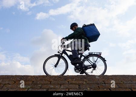 livreur de vélo électrique Banque D'Images
