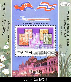 Bloc-feuillet avec timbre oblitéré imprimé par la Corée du Nord, qui montre les premiers timbres de la Corée du Nord et de la Thaïlande, exposition internationale de timbres Banque D'Images