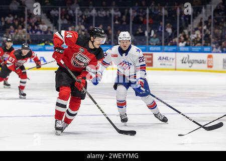 26 janvier 2024 : l'attaquant des Utica Comets Shane Bowrs (14) patine en première période contre les Americans de Rochester. Les Americans de Rochester ont accueilli les Utica Comets dans un match de la Ligue américaine de hockey à Blue Cross Arena à Rochester, New York. (Jonathan Tenca/CSM) Banque D'Images