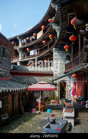 Zheng Cheng Lou tulou fait de terre battue, de pierre et de bois dans le Fujian, Chine Banque D'Images