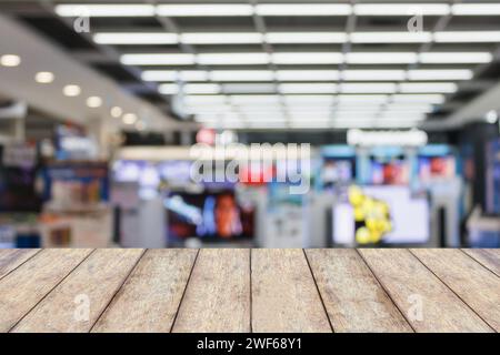 Téléviseur Smart TV 4K système Home Entertainment Ultra HD sur les étagères du grand magasin etronic résumé flou flou arrière-plan flou flou Banque D'Images
