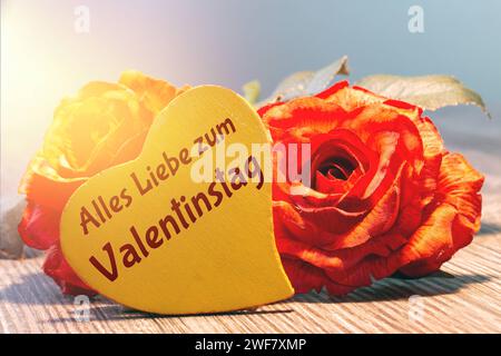 Grüße zum Valentinstag : Rosen und ein Herz mit der Aufschrift ALLES LIEBE ZUM VALENTINSTAG *** Salutations pour la Saint Valentin Roses et un coeur avec l'inscription TOUT L'AMOUR POUR LA SAINT VALENTIN Copyright : xx Banque D'Images