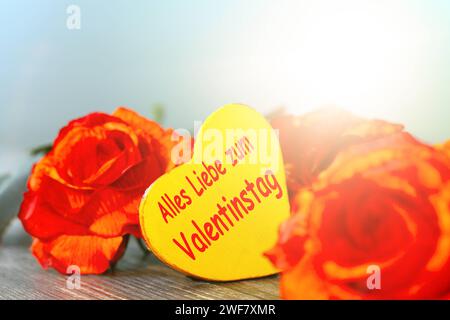 Grüße zum Valentinstag : Rosen und ein Herz mit der Aufschrift ALLES LIEBE ZUM VALENTINSTAG *** Salutations pour la Saint Valentin Roses et un coeur avec l'inscription TOUT L'AMOUR POUR LA SAINT VALENTIN Copyright : xx Banque D'Images