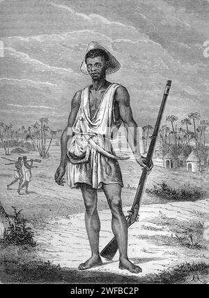Soldat du Dahomey portant un fusil à long-canon de l'ancien Royaume du Dahomey (1600-1904), aujourd'hui Bénin, Afrique de l'Ouest. Gravure vintage ou historique ou Illustration 1863 Banque D'Images