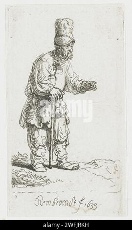 Un paysan dans une casquette haute, debout appuyé sur un bâton, Rembrandt van Rijn, 1639 papier gravé les âges de l'homme (+ vieil homme (être humain)) Banque D'Images