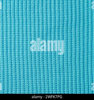 Fond de texture tricoté. Tricot. Papier peint bleu abstrait Banque D'Images