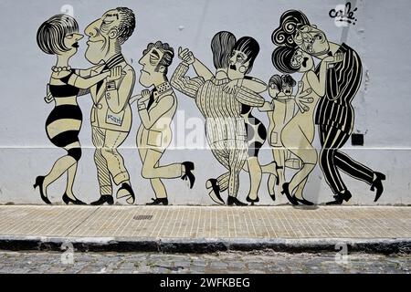 Un exemple du Street art de Buenos Aires représentant des personnages de dessins animés dansant le tango. Buenos Aires est réputée pour sa culture vivante du Street art. Banque D'Images