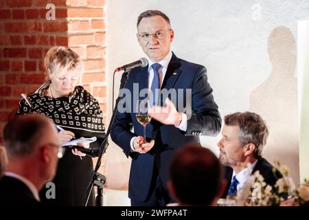 Le président polonais Andrzej Duda prend la parole lors d’un grand dîner dans la galerie Kubicki au Palais Royal de Varsovie, en Pologne, le mercredi 31 janvier 2024. Le roi Frederik X et le président de la Pologne sont les invités d'honneur du dîner offert par l'ambassadeur du Danemark en Pologne. Le roi est en promotion officielle des affaires en Pologne de janvier 30 à février 2, avec des programmes à la fois dans la capitale Varsovie et dans la ville portuaire Szczecin. La visite est axée sur l'énergie verte et l'agriculture et pendant la visite, la majesté sera accompagnée par le ministre des Affaires étrangères, le ministre de l'alimentation et le ministre de l'alimentation Banque D'Images