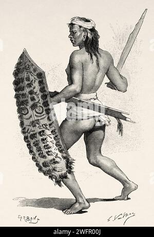 Tring Dayak guerrier en robe de guerre, Kalimantan. Île de Bornéo, Indonésie. De Koutei à Banjarmasin, un voyage à travers Bornéo par Carl Bock (1849 - 1932) Banque D'Images