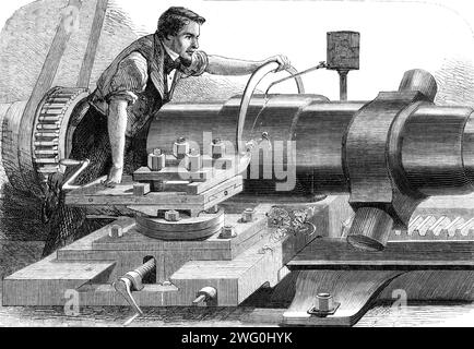 Fabrication de l'Armstrong Gun à Woolwich Arsenal : tournage de finition d'un 100 livres, 1862. « Le canon, qui est maintenant complètement construit, est transporté à un tour pour être tourné de finition, comme le montre notre illustration... ceci est effectué dans une partie d'un bâtiment élevé et vaste, dont on nous a dit qu'il était autrefois utilisé comme fonderie pour le moulage des anciens modèles-pistolets, mais a été transformé en deux ou trois grands magasins, dans lesquels sont de puissants tours de tournage et d'autres machines utilisées en relation avec la classe plus lourde des pistolets. L'ouvrier dans la gravure est vu appliquer une jauge Banque D'Images