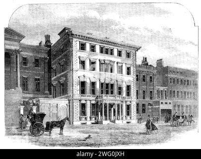 Architecture de rue - le nouveau manoir du Baron Rothschild, Piccadilly, 1862. Vue de '...le manoir qui vient d'être construit pour le Baron Rothschild à Piccadilly, attenant Apsley House. Il occupe un site de 67ft. façade par 90ft. en profondeur, et est construit sur un lit de béton s'étendant sur toute la surface de l'étage du sous-sol. Le mur avant est en pierre Portland, et les façades latérales et arrière sont revêtues du même matériau, la maçonnerie étant tout au long posée en ciment Portland... il y a quatre salons au rez-de-chaussée... l'escalier principal est en marbre... du premier palier tw Banque D'Images