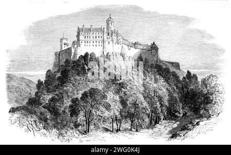 Le château de Wartburg, Allemagne, le "Patmos" de Luther - d'après un croquis de notre artiste spécial, 1862. 'Le château de Wartburg [était] l'asile de Luther du 4 mai 1521 au 6 mars 1522. Luther avait l'habitude de comparer le château de Wartburg à l'île de Patmos, à laquelle la colère de Domitien, dans le passé, avait banni l'apôtre Jean... Une heure de marche jusqu'à la montée abrupte amène le visiteur au sommet, d'où un panorama glorieux s'ouvre sur la vue. Une mer de rochers et de collines boisées dans toutes sortes de formes ondulent autour ; tandis que près d'un millier de pieds au-dessous d'Eisenach est faiblement discerné, ap Banque D'Images