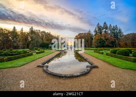 Rhinefield House Hôtel au lever du soleil, Brockenhurst, la New Forest, Hampshire, Angleterre, Royaume-Uni Banque D'Images