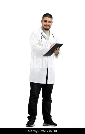 Le médecin, en pleine hauteur, sur fond blanc, écrit Banque D'Images