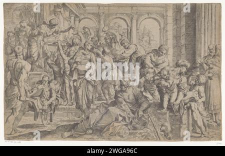 Saint Rochus distribue des aumônes, anonymes, d'après Annibale Carracci, 1610 face imprimée dans une structure avec des colonnes et des arcs ronds. Sur une élévation à gauche, les saints aumônes Rochus distribuent à une foule d’hommes, de femmes, d’enfants et de crépitements. Italie papier gravure St. Roch distribue ses richesses aux pauvres, et part en pèlerinage Banque D'Images