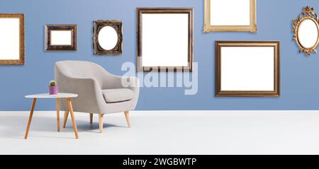 Intérieur contemporain de salon avec collection de cadres vides accrochés au mur Banque D'Images
