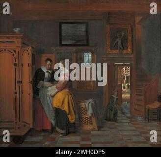 Intérieur avec des femmes à côté d'un placard de lin, Pieter de Hooch, 1663 peinture Maison intérieure avec deux femmes, une mère et une fille, qui stockent le linge plié dans un placard de lin. À côté de la jeune femme, à droite, il y a un panier à linge en osier et une feuille de bois. A la porte de la chambre une fille avec pompe et balle joue. Sur la droite est une chaise à l'escalier, derrière la fille un aperçu à travers la maison au canal à l'extérieur. Au-dessus de la porte se trouve une statue pour une peinture. toile. peinture à l'huile (peinture) linge de placard. gestion du ménage ; femme au foyer au travail. intérieur de la maison. 'kolf' (jeu de balle). chil Banque D'Images