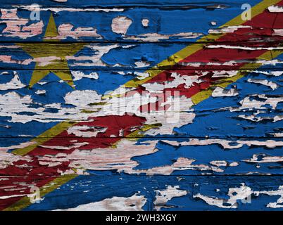 Drapeau de la République démocratique du Congo peint sur une planche de bois grunge. Banque D'Images