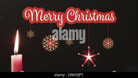 Image de joyeux texte de noël sur bougie et décorations fond Banque D'Images