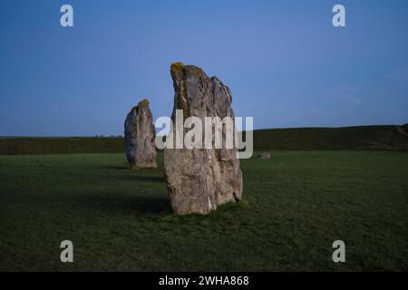 Coucher de soleil à Avebury, Britains Greatest Stone Circle, Avebury, Wiltshire, Angleterre, Royaume-Uni, GB. Banque D'Images