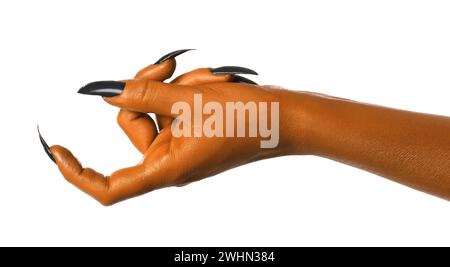 Monstre effrayant. Main orange avec griffes isolées sur blanc Banque D'Images