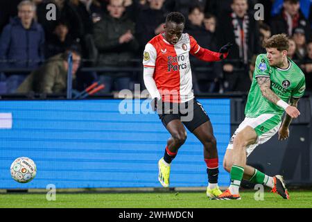 Rotterdam, pays-Bas. 11 février 2024. ROTTERDAM, PAYS-BAS - 11 FÉVRIER : Yankuba Minteh de Feyenoord, Django Warmerdam de Sparta Rotterdam lors du match Néerlandais Eredivisie entre Feyenoord et Sparta Rotterdam au Stadion Feyenoord le 11 février 2024 à Rotterdam, pays-Bas. (Photo de Broer van den Boom/Orange Pictures) crédit : Orange pics BV/Alamy Live News Banque D'Images