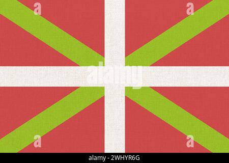 Drapeau national du pays Basque sur la surface du tissu. Drapeau du pays basque. Drapeau national basque sur la texture Banque D'Images