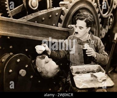 Scène cinématographique des temps modernes - Charlie Chaplin - de Max Munn Autrey (United Artists, 1936) Banque D'Images