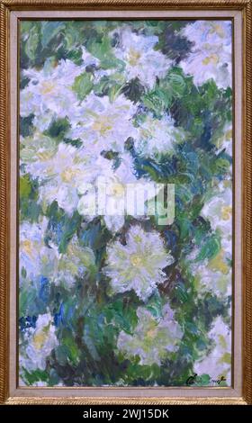 Chef-d'œuvre impressionniste de clématite blanche, peinture à l'huile de (1887) par Claude Monet (1840-1926) dans un cadre en bois doré décoratif Banque D'Images