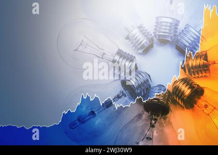 Ampoules et graphique en hausse représentant le prix actuel de l'électricité pendant la crise énergétique dans le monde Banque D'Images
