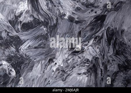 Peinture abstraite monochrome avec motifs et textures fluides. Banque D'Images