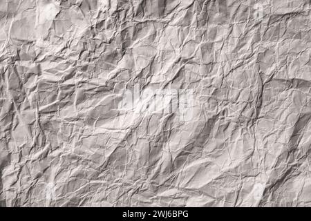 Texture de papier froissé gris comme fond. Banque D'Images
