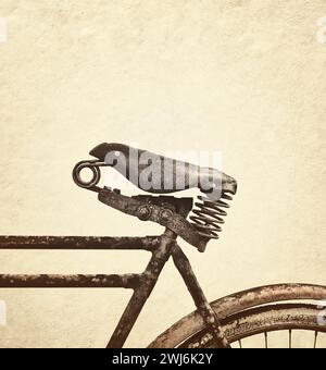 Image de style rétro d'un siège de vélo en cuir vieilli Banque D'Images