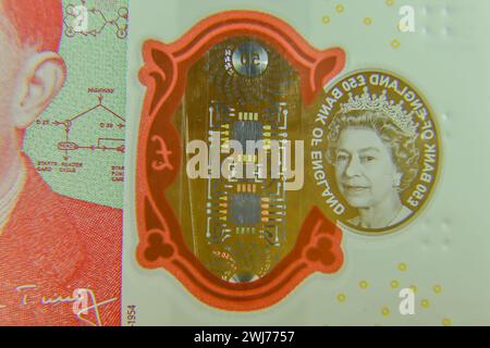 Image macro billet de 50 £ du Royaume-Uni représentant un portrait de la reine Elizabeth II en gros plan avec mise au point sélective Banque D'Images