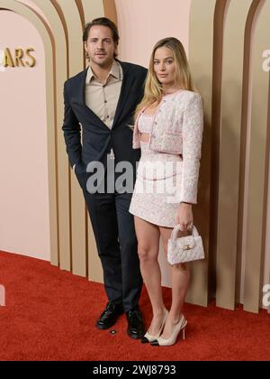 12 février 2024, Beverly Hills, Californie, États-Unis : Tom Ackerley et Margot Robbie assistent au 96e déjeuner des nominés OscarsÂ®. (Crédit image : © Billy Bennight/ZUMA Press Wire) USAGE ÉDITORIAL SEULEMENT! Non destiné à UN USAGE commercial ! Banque D'Images